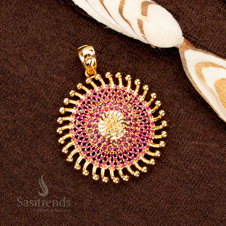 Regal gold plated Lakshmi pendant, featuring dazzling ruby AD stones, radiating elegance in ethnic jewellery collections - Sasitrends