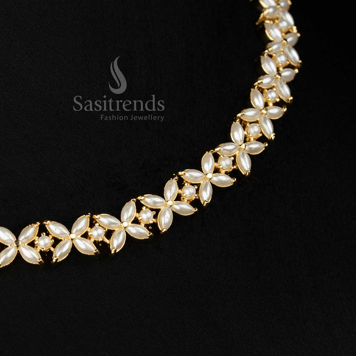 Timeless micro gold plated pearl four petal AD floral Necklace curated for evening occasions and ethnic styling -Sasitrends