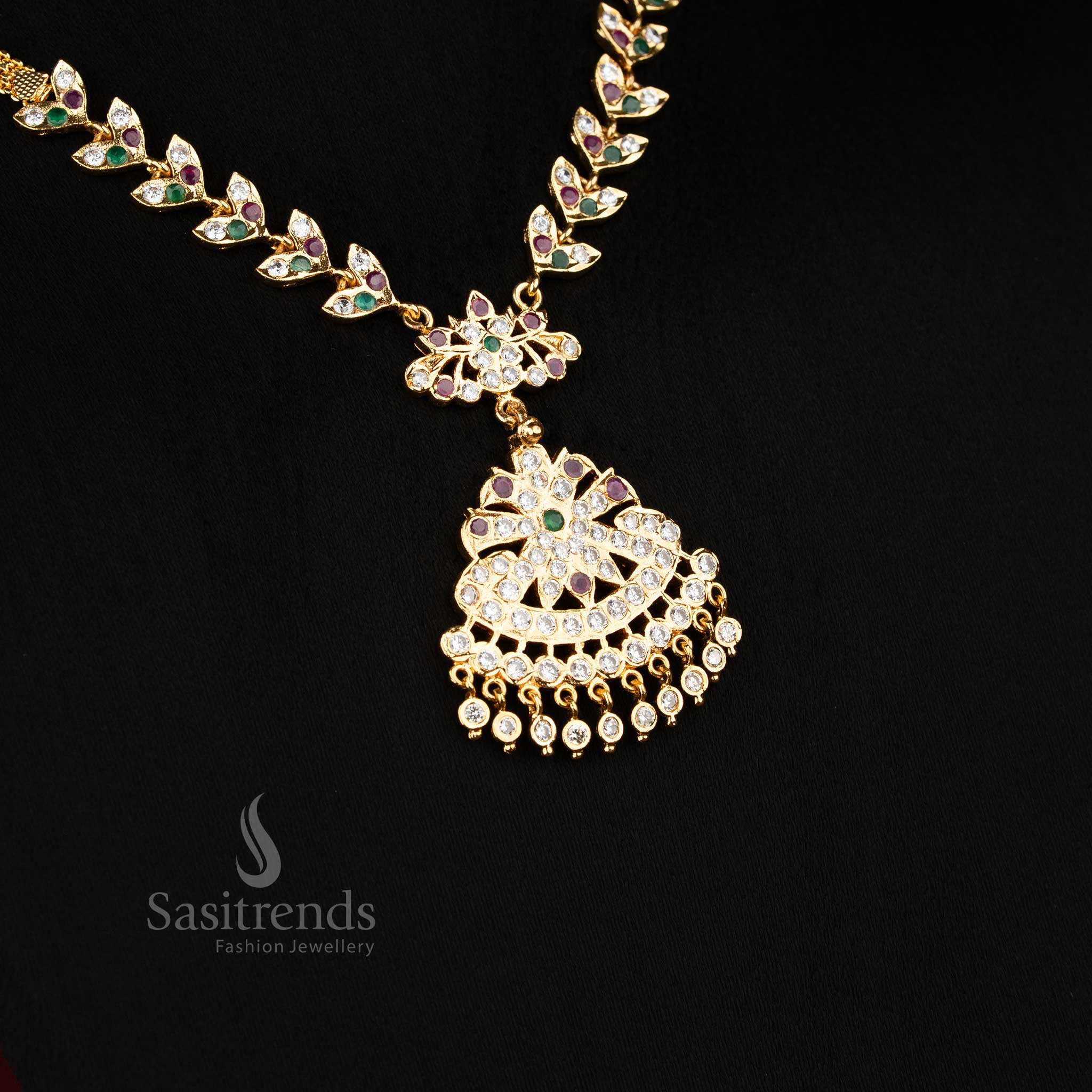 Regal multi micro gold plated leafy necklace featuring colourful stone studded ornamental pendant, perfect jewellery for bridal saree and grand ethnic functions - Sasitrends