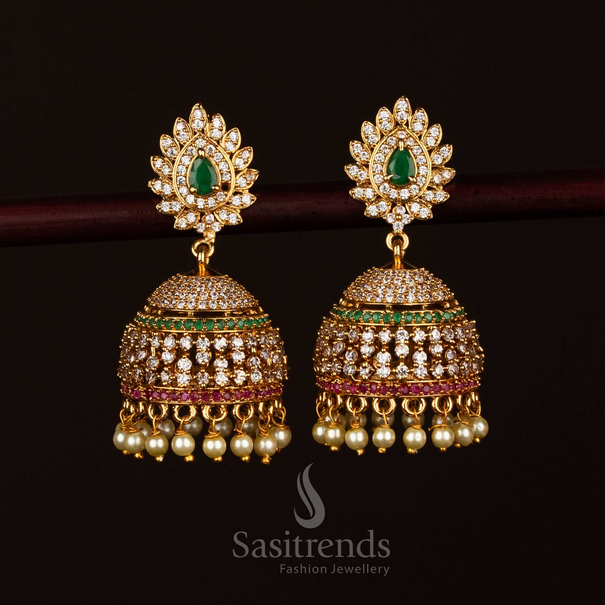 Ornate multi temple matte gold teardrop AD stone jhumka earrings perfect for traditional wear - Sasitrends