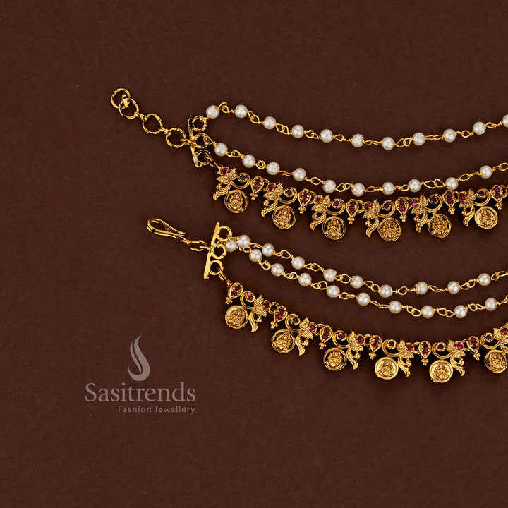 Lakshmi design temple matte gold plated American diamond matils enriched with deep ruby stones and pearl accents, crafted for bridal wedding splendour - Sasitrends