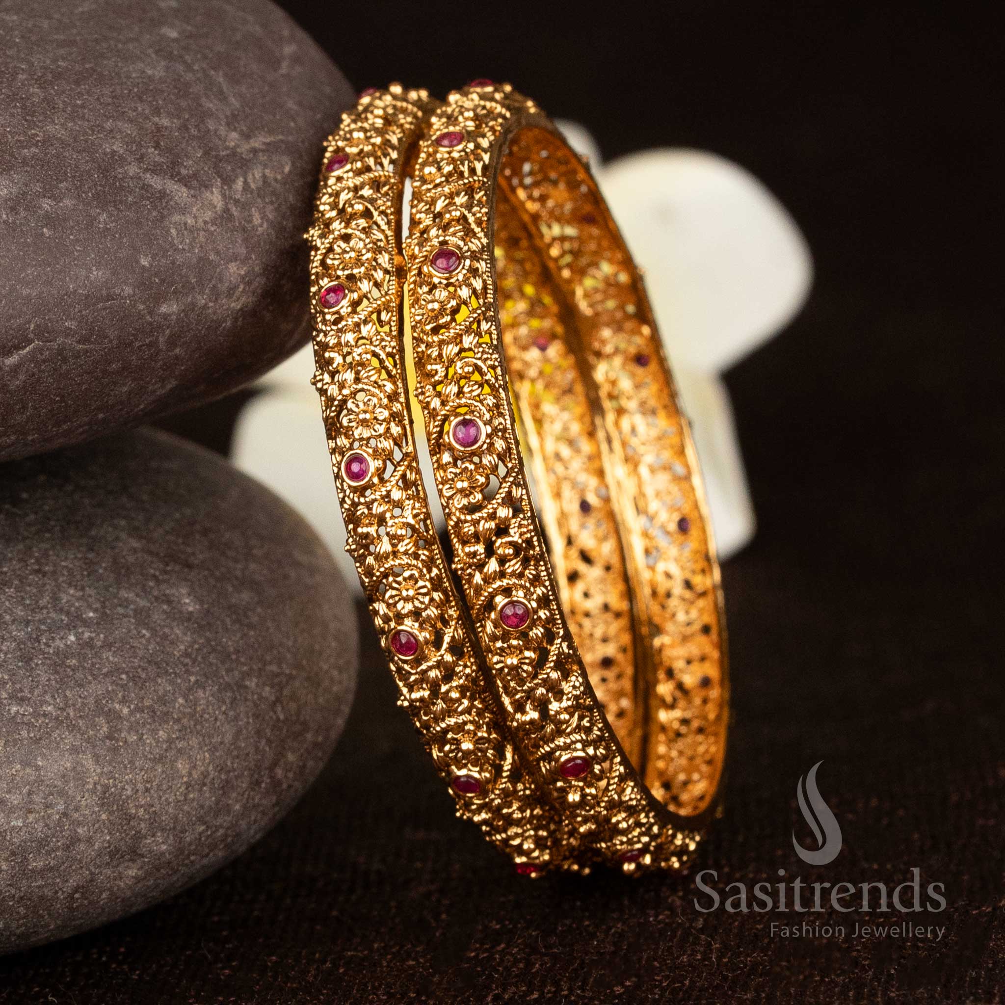 Radiant ruby floral nakshi bangle in temple matte gold plating with shimmering round stone accents for elegant celebrations - Sasitrends
