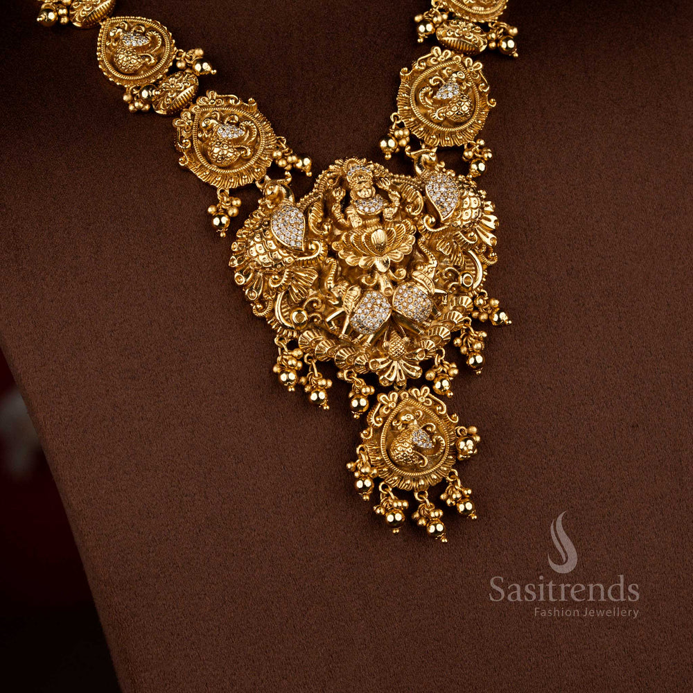 Heritage white premium matte gold plated temple Lakshmi dual peacock necklace ideal for grand traditional festive functions and classical bridal wear – Sasitrends