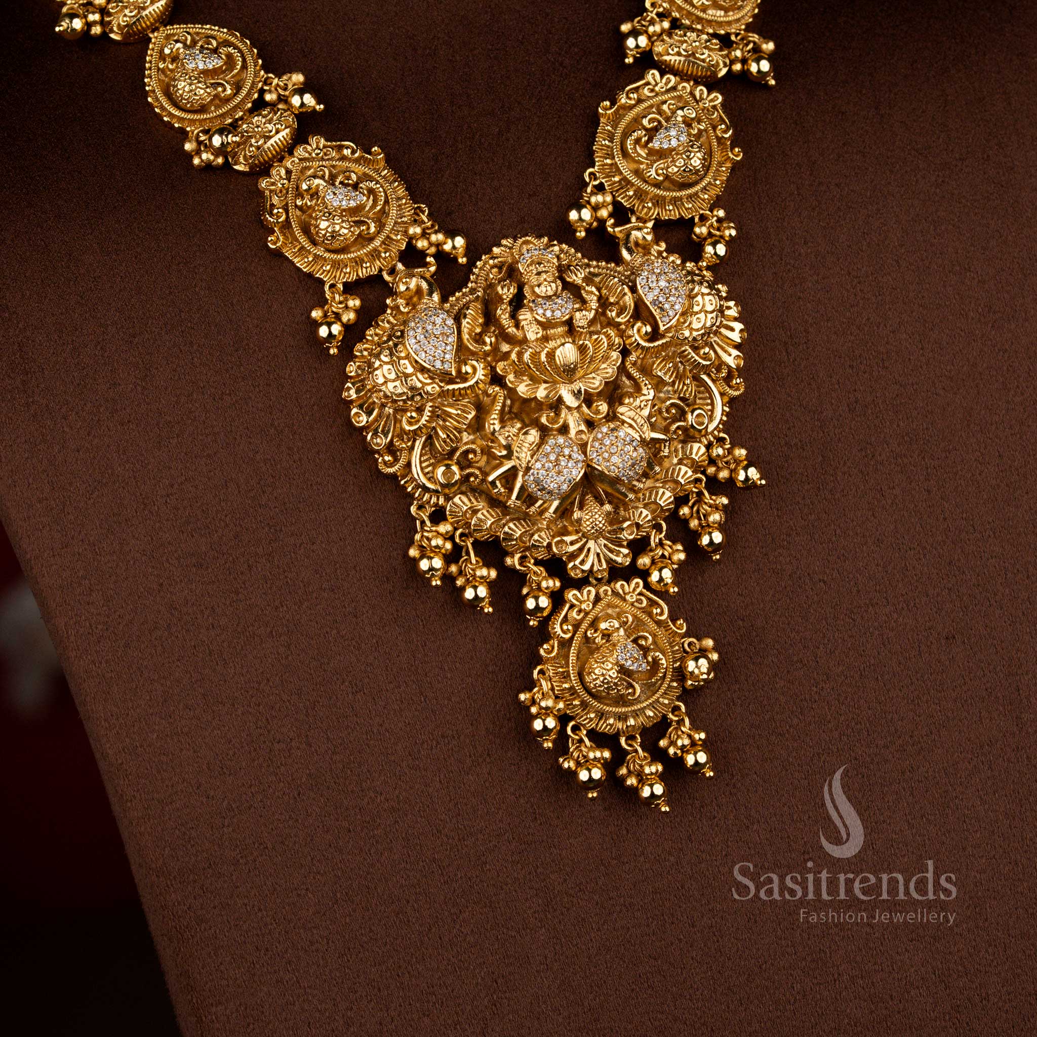 Heritage white premium matte gold plated temple Lakshmi dual peacock necklace ideal for grand traditional festive functions and classical bridal wear – Sasitrends