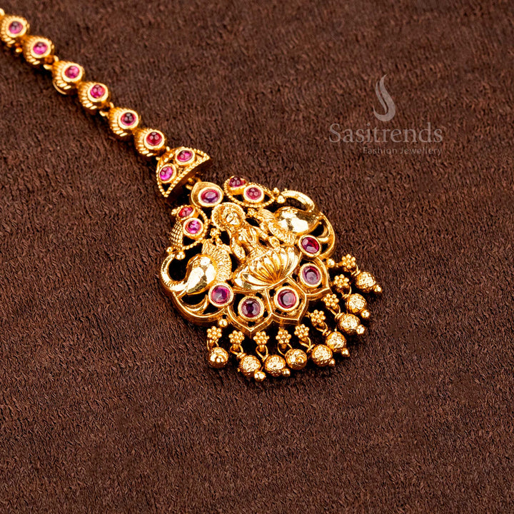Luxurious temple inspired matte finish Lakshmi peacock mango tikka with shining AD drops, crafted specially for the bridal jewellery look with grandeur -sasitrends