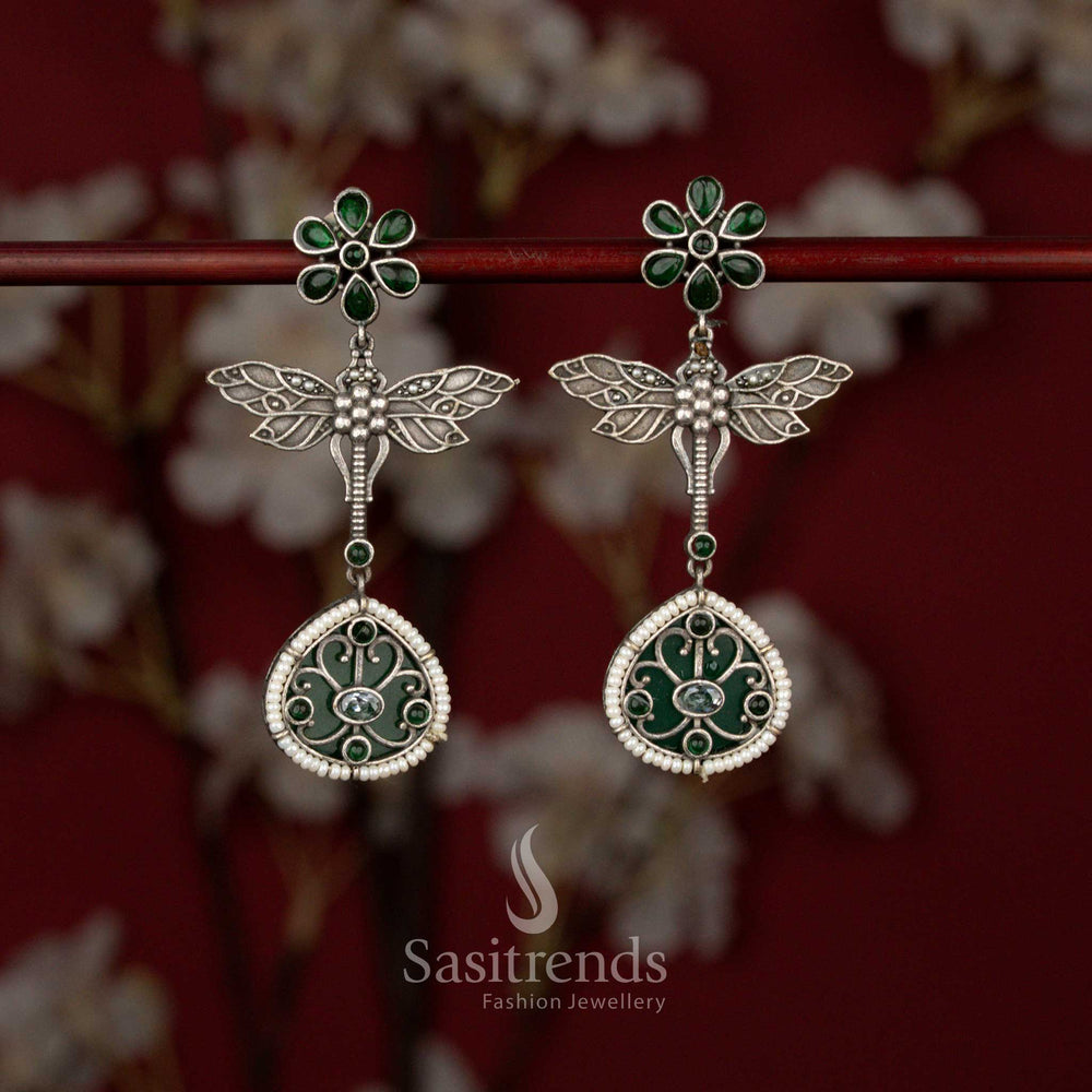 Beautiful Antique Oxidised 6-Petal Floral Dragonfly Wings Teardrop Earrings with Pearl Accents for Navarathri Wear - Sasitrends