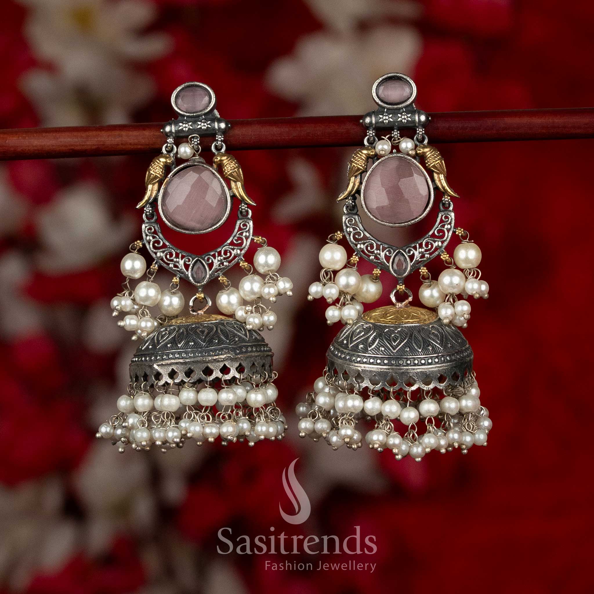 Charming dual tone 92.5 silver plated oxidised bird crescent dangler earrings pink colour for cheerful festive wear Sasitrends