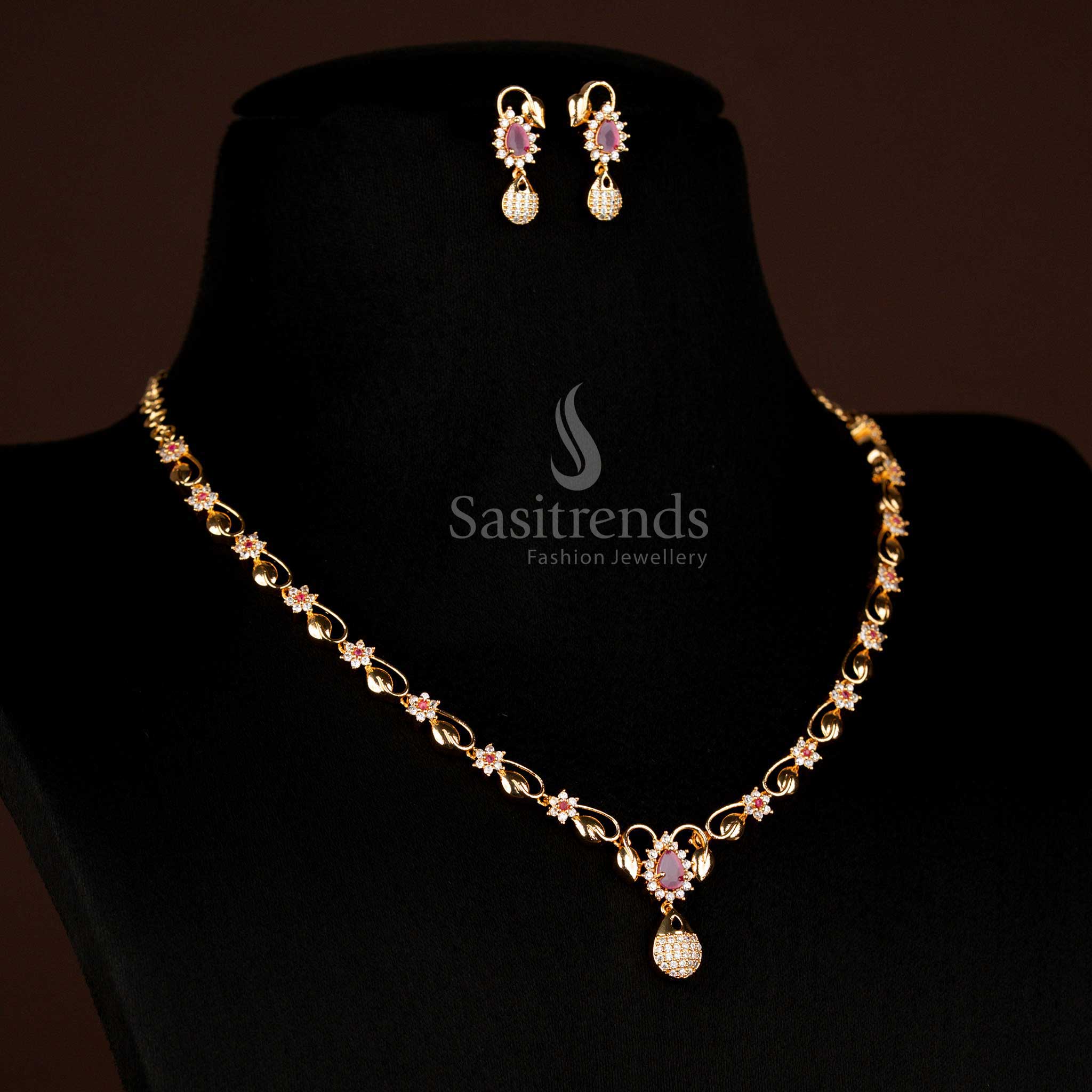 Opulent blend micro gold AD teardrop pendant necklace featuring white and ruby dual-tone stones, designed for traditional celebrations and bridal luxury – Sasitrends