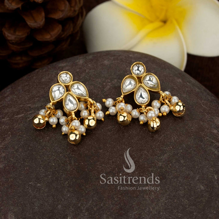 24K jadau gold plated white kundan stone floral leaf bugadi earrings for traditional festive wear - Sasitrends