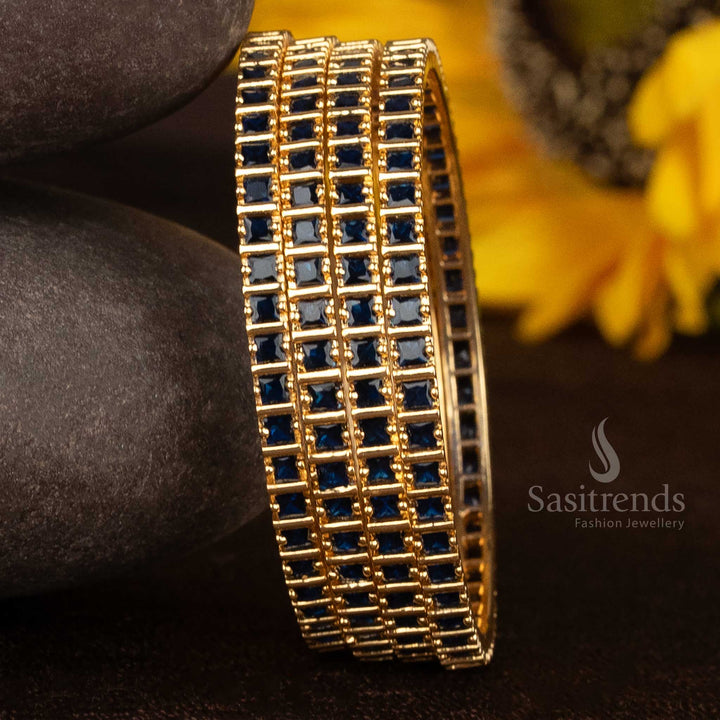 Stylish square bangles crafted in micro gold plating with radiant royal blue American diamond stones and artistic carved edges for ethnic sophistication – Sasitrends