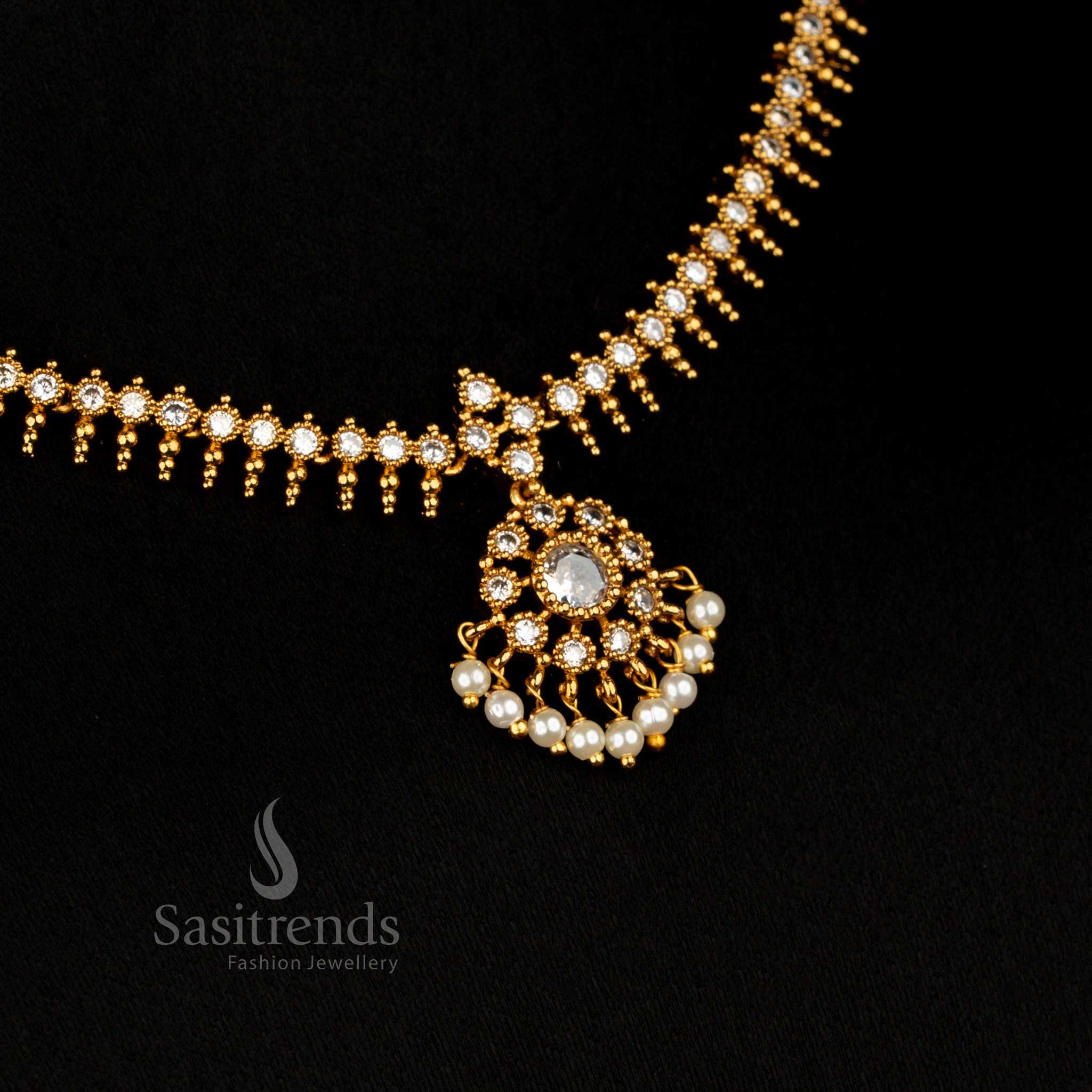 Pure temple matte gold AD stone Necklacefeaturing white circular floral motifs with a delicate drop design, perfect for bridal and traditional festive wear – Sasitrends