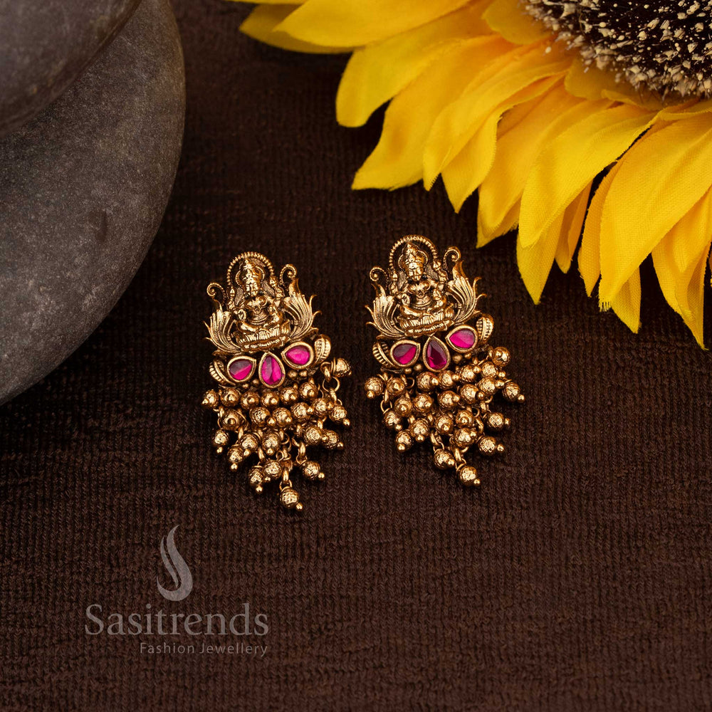 Traditional Matte Gold Lakshmi Temple Style Earrings with Ruby Stone Accents and Gold Beads – Sasitrends
