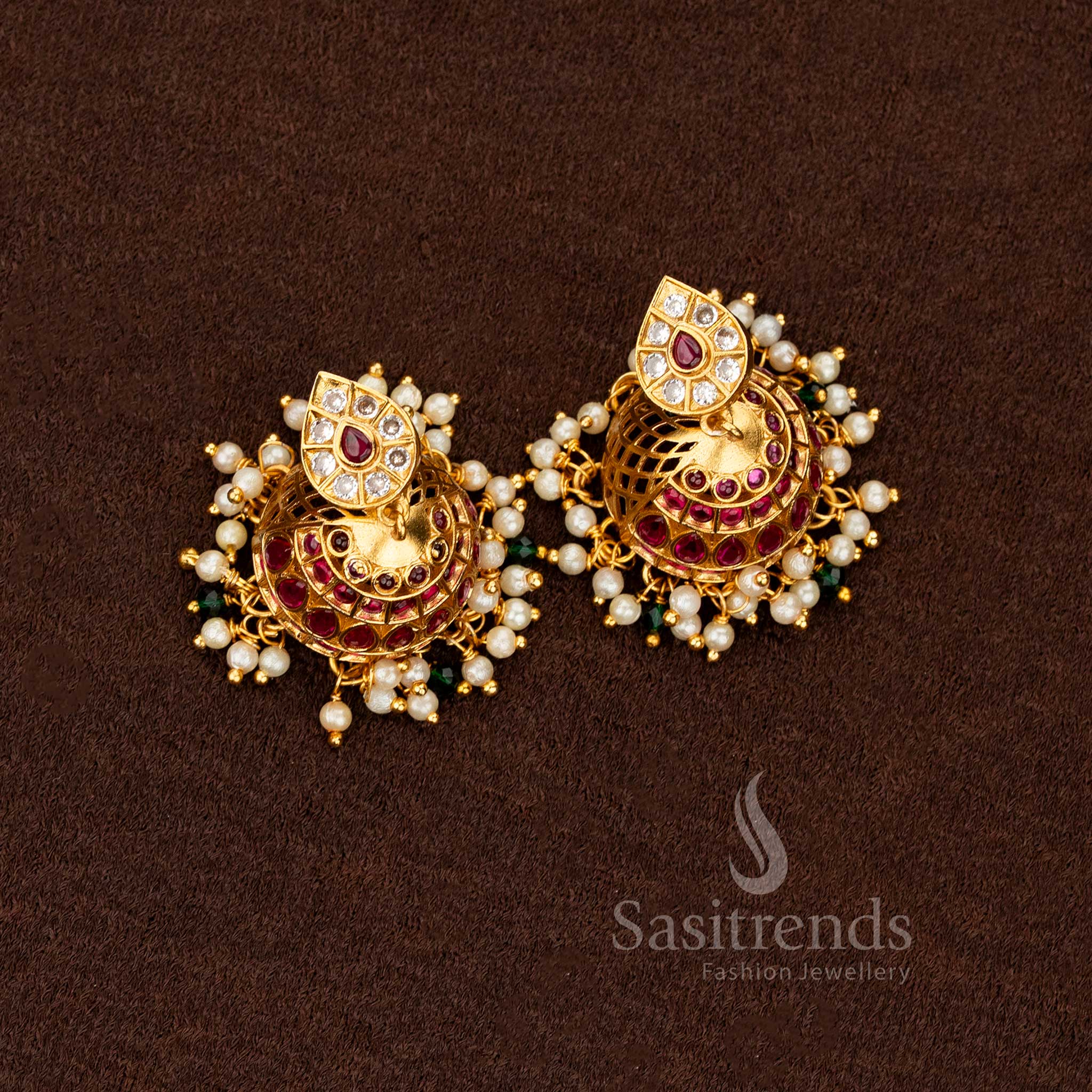 Charming Ruby-White Matte Gold Floral Design AD Earrings enhanced with pearl drop detailing, a graceful touch for festive elegance — Sasitrends