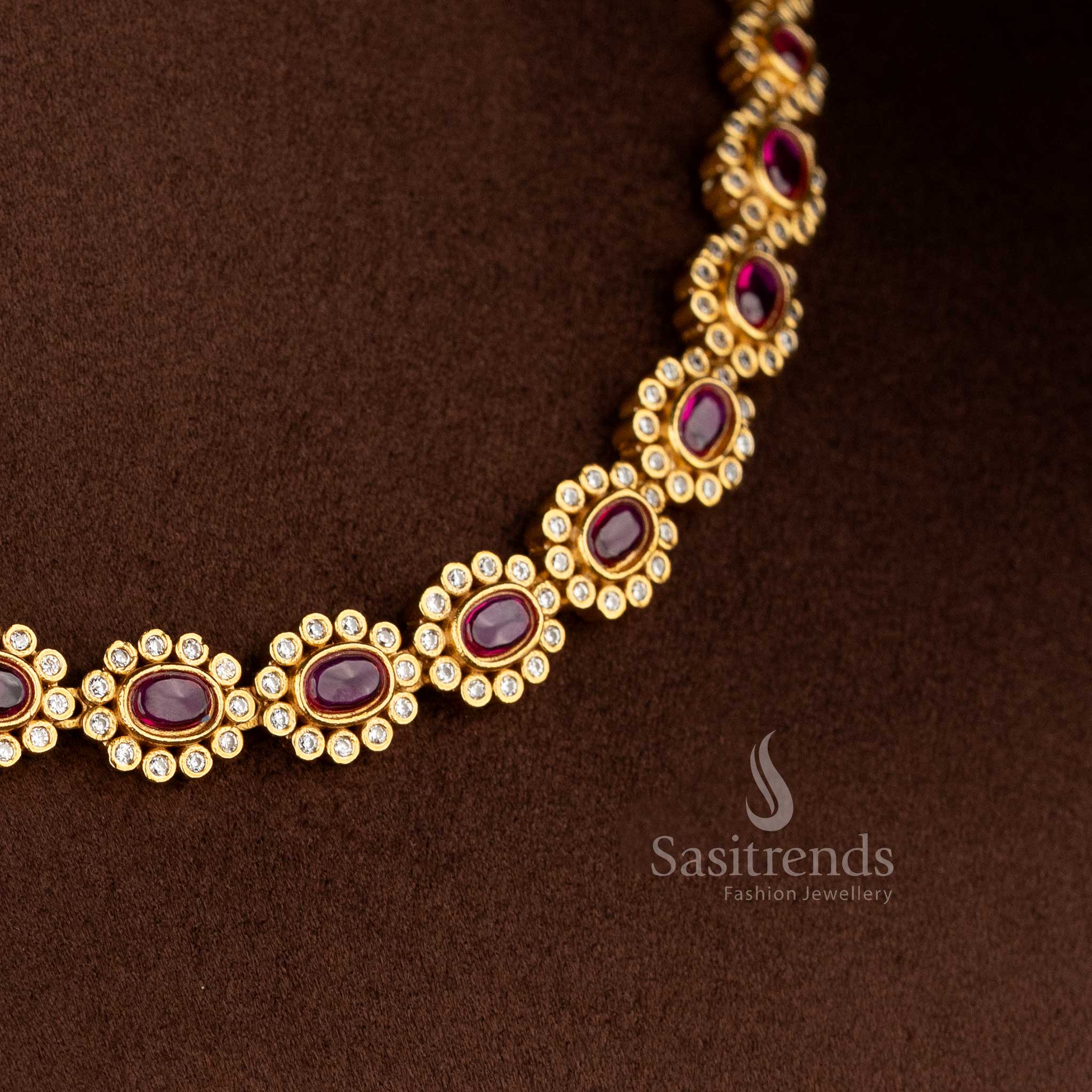 Regal matte gold plated ruby oval floral AD statement necklace for silk sarees, festive kurtis, and elegant occasions – Sasitrends