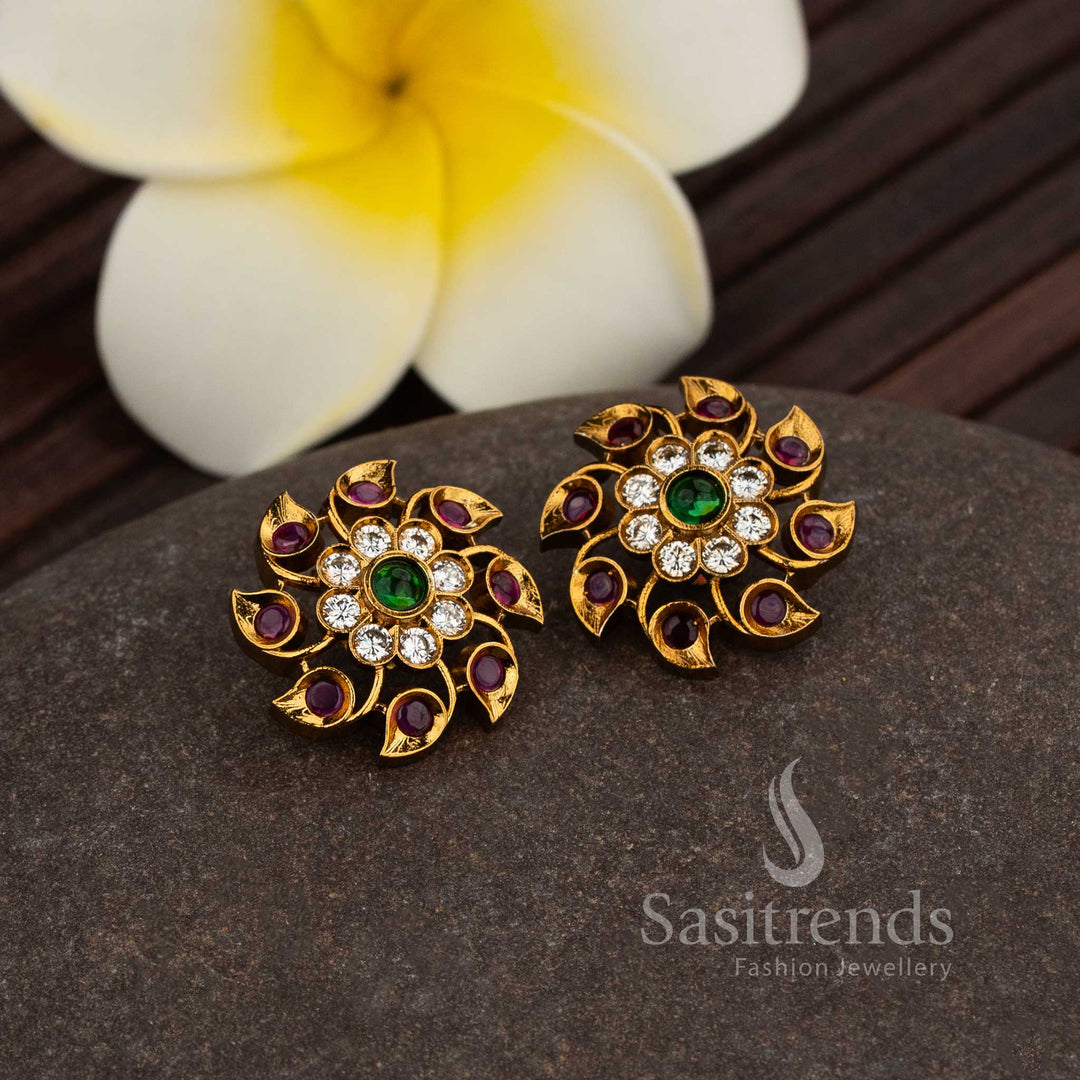 Matte Gold Plated Spiral Floral Stud Earrings With Multi-Stone American Diamond Detailing, Offering A Glamorous Traditional Jewellery Style Perfect For Festive Sarees And Party Wear Ensembles By Sasitrends