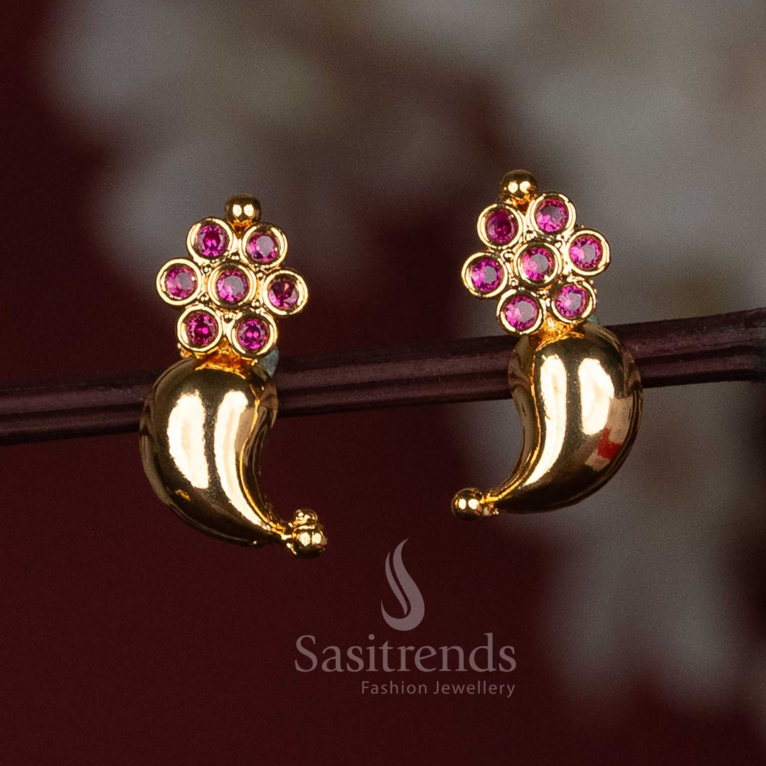 Traditional ruby-coloured mango earrings in micro gold plating, featuring shimmering AD stones and a graceful floral stud – ideal for festive saree jewellery styling by Sasitrends