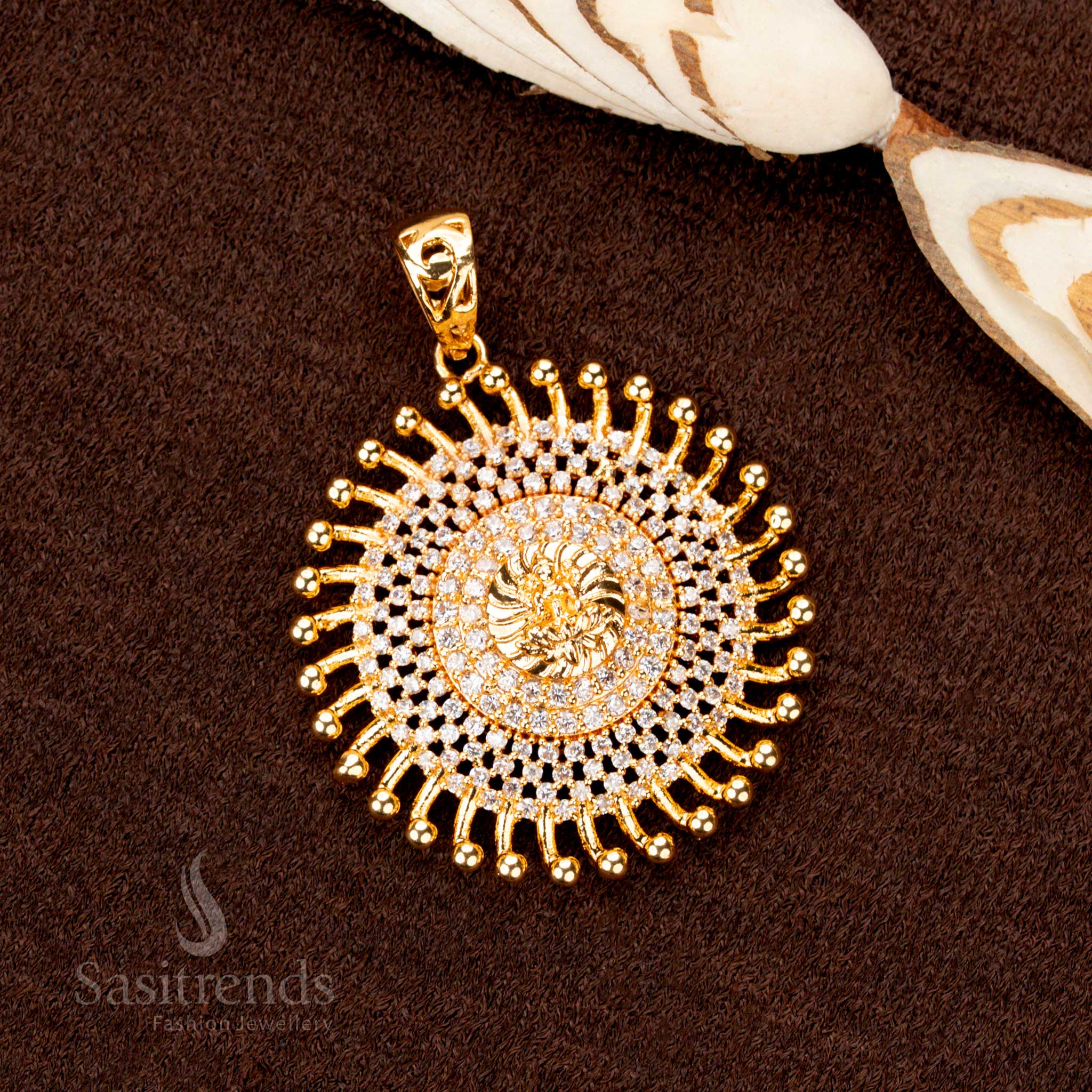 Opulent gold plated Lakshmi pendant, decorated with sparkling white AD stones, a sophisticated ethnic jewellery masterpiece - Sasitrends