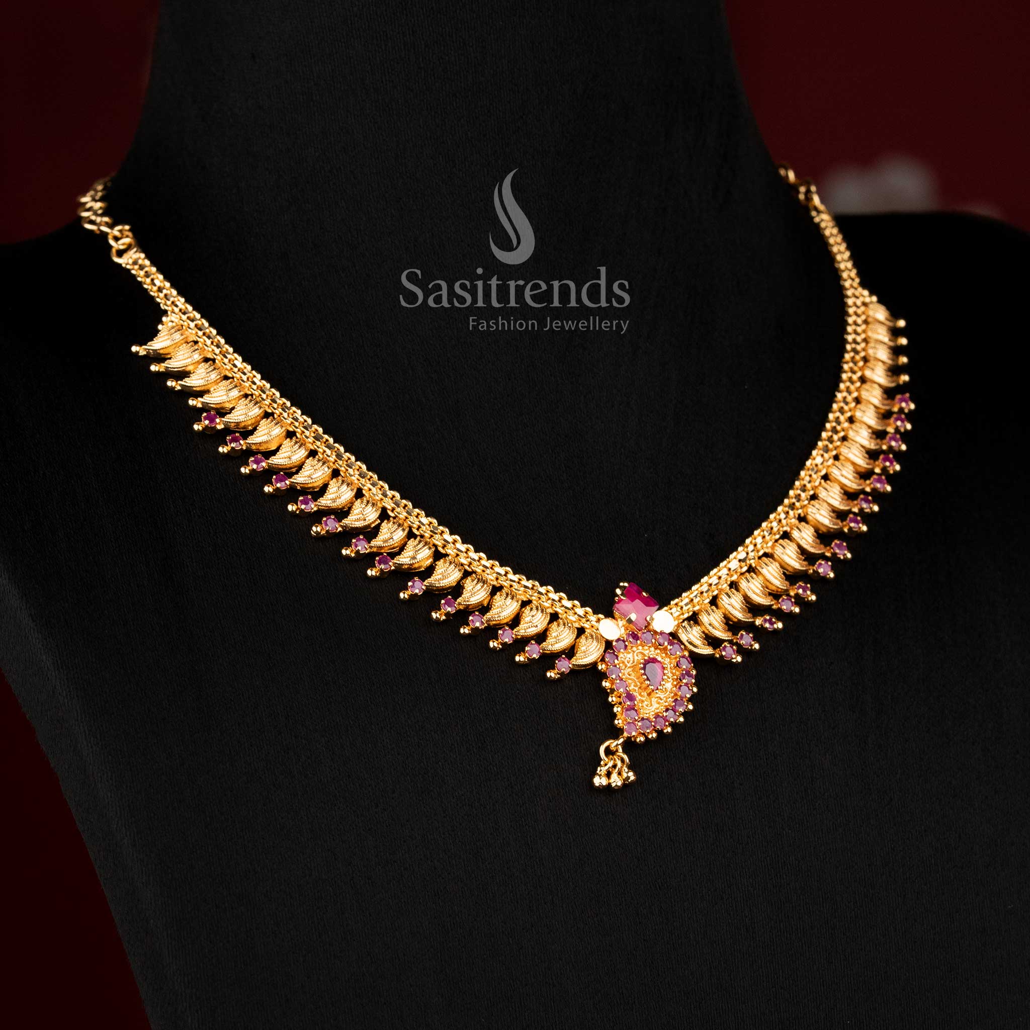 Stylish micro gold plated ruby leaf fringe necklace with AD stone sparkle and hanging drops, ideal for party wear – Sasitrends