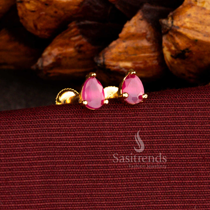 Regal micro gold plated teardrop stud earrings in ruby featuring intricate temple-inspired motifs, ideal for bridal wear, festivals, and traditional gatherings – Sasitrends