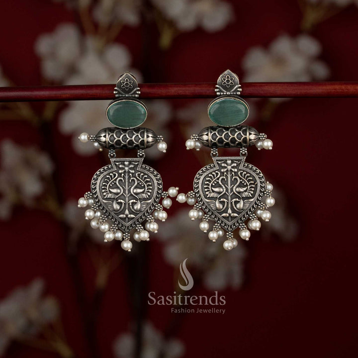 Regal oxidised German silver mint temple-inspired layered drop earrings with shield engravings and pearl cluster adornment – Sasitrends