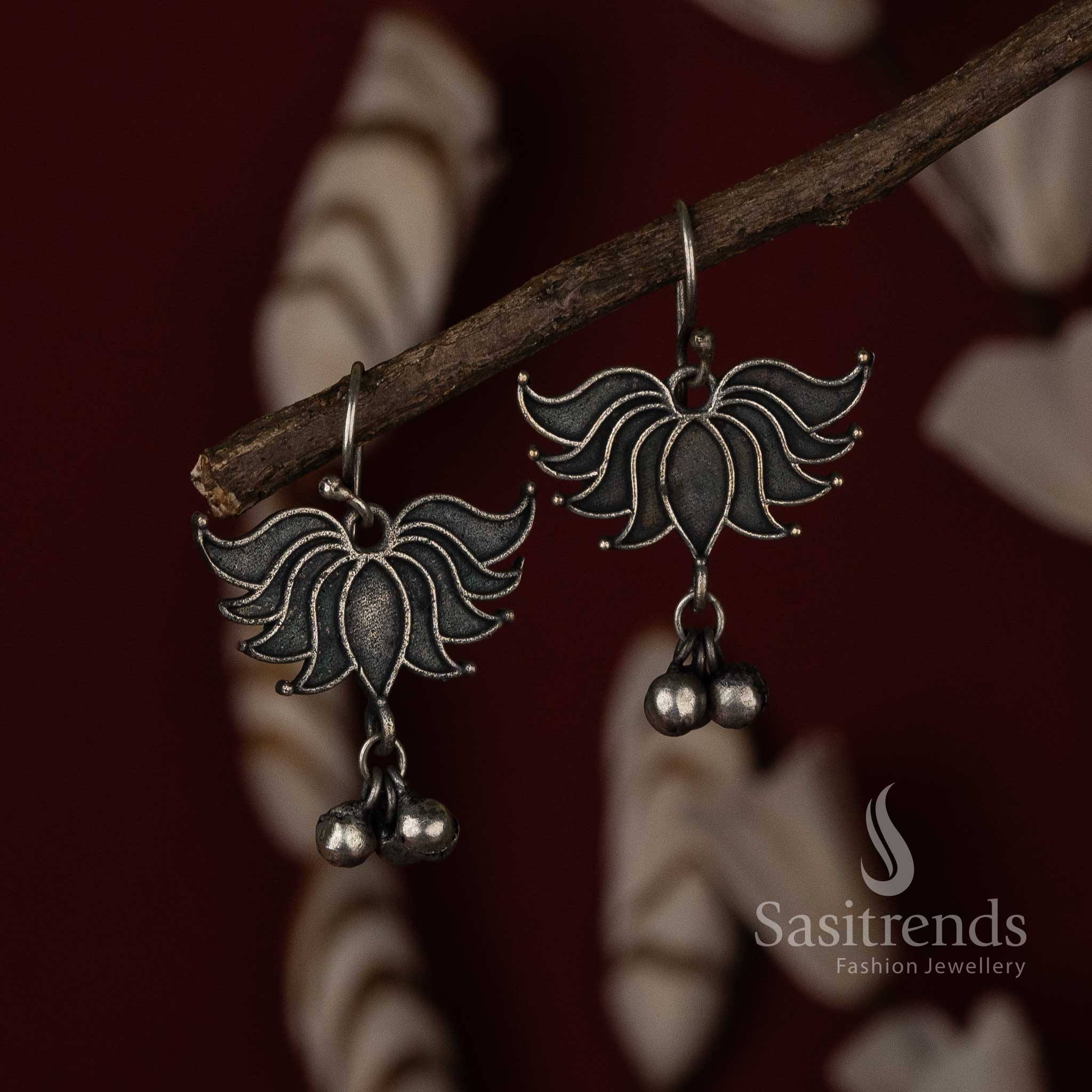 Boho chic lotus fish hook earrings in oxidised silver with hand-etched details and lightweight finish – a trendy fashion jewellery pick for women and girls – Sasitrends