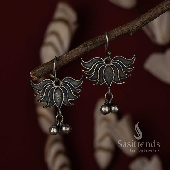 Boho chic lotus fish hook earrings in oxidised silver with hand-etched details and lightweight finish – a trendy fashion jewellery pick for women and girls – Sasitrends
