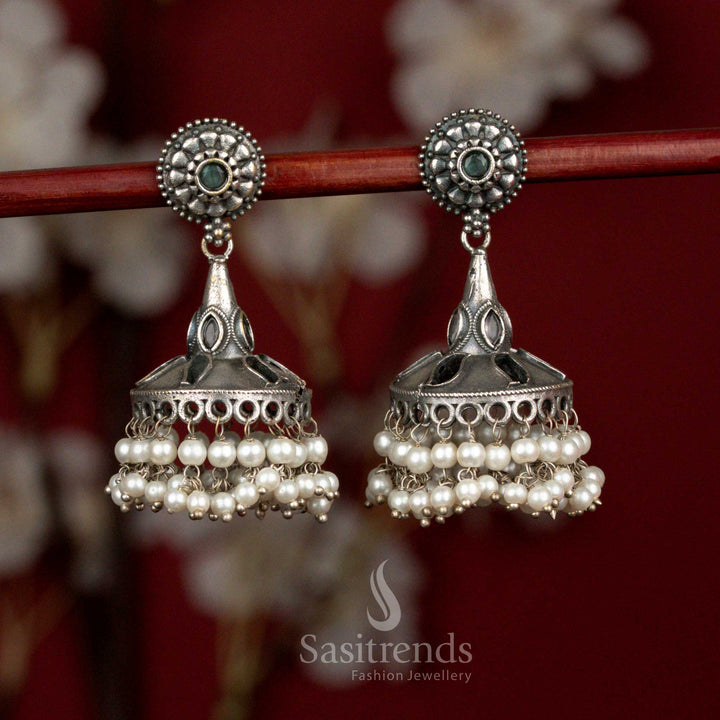 Antique oxidised 92.5 silver jhumka earrings featuring mint stone highlights, round floral bell dome structure and soft pearl hangings for graceful ethnic styling - Sasitrends