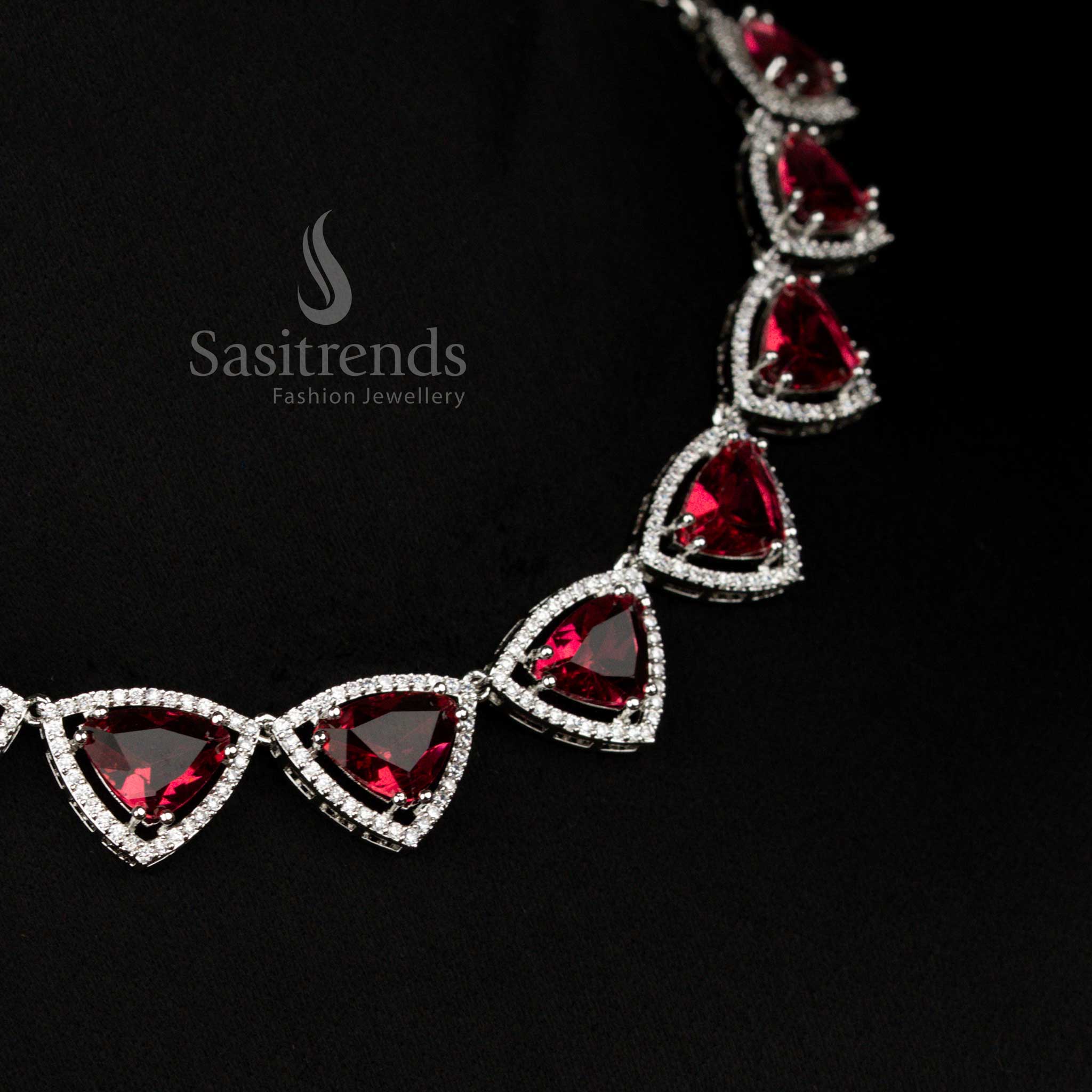 Regal red rhodium silver triangular necklace featuring sparkling American Diamonds for luxury occasions and festive wear – Sasitrends