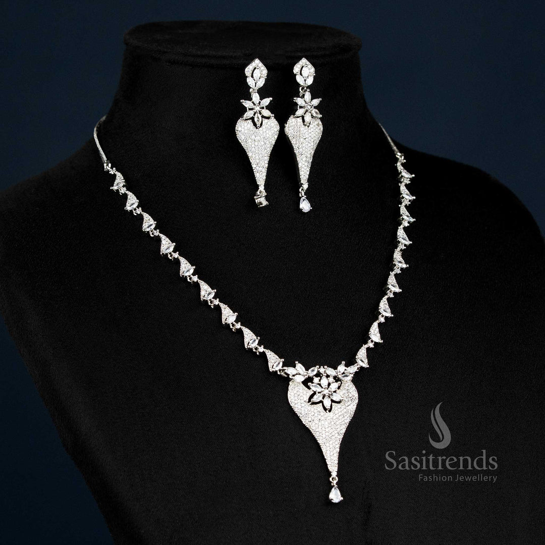 Rhodium plated designer necklace set with a floral drop pendant and shimmering American diamonds, perfect for luxurious evening occasions – Sasitrends