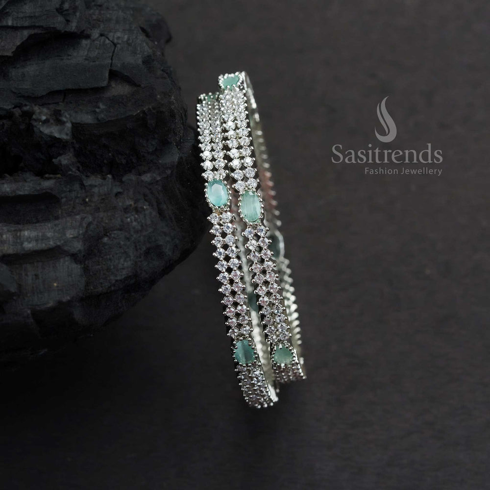 Chic Party Wear Rhodium Silver Bangles With Mint Oval American Diamond Stones And Smooth Lustrous Finish Jewellery - Sasitrends