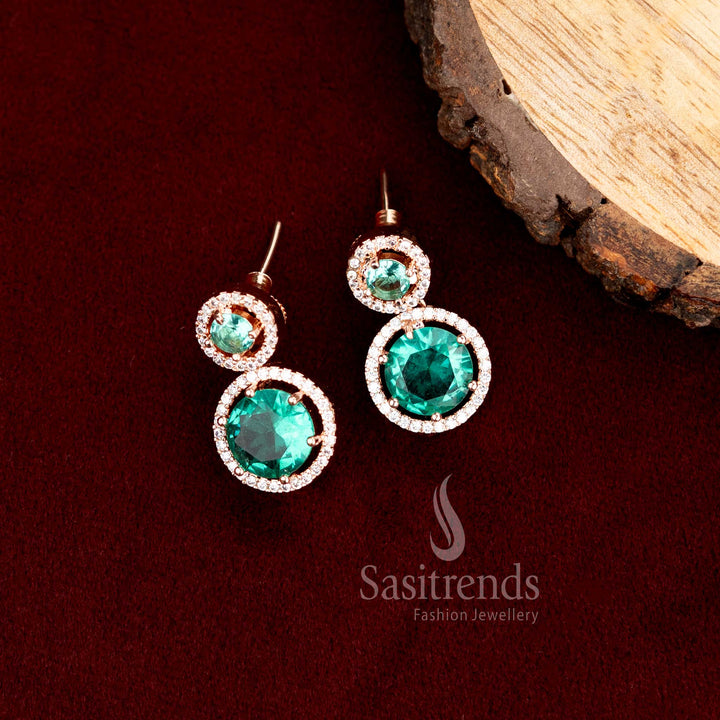 Chic Round Rose Gold Earrings Embellished With Sparkling American Diamond Stones And Glossy Green Hues – A Stylish Choice For Modern Festive Outfits – Sasitrends