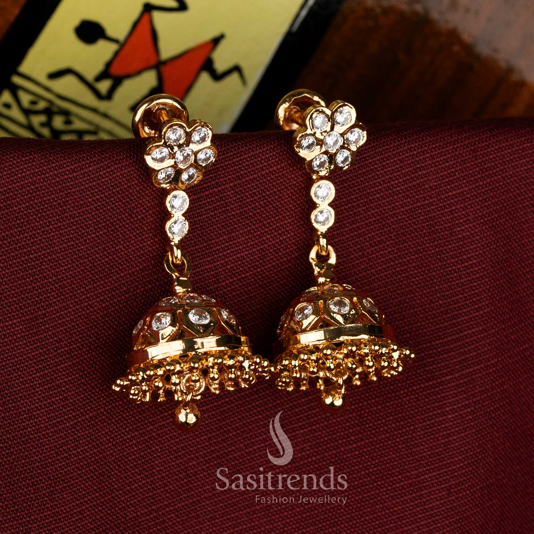 Elegant white impon addigai micro gold plated floral screw jhumka earrings suitable for festive traditional functions - Sasitrends