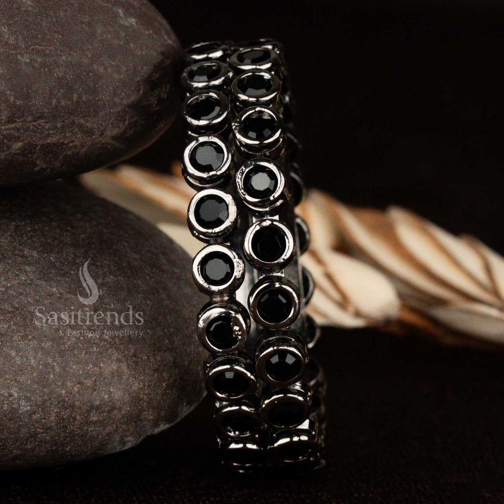 Bold vintage-look oxidised black bangles adorned with shiny black stones on a rich black metal base, designed for statement styling with party or ethnic outfits – Sasitrends