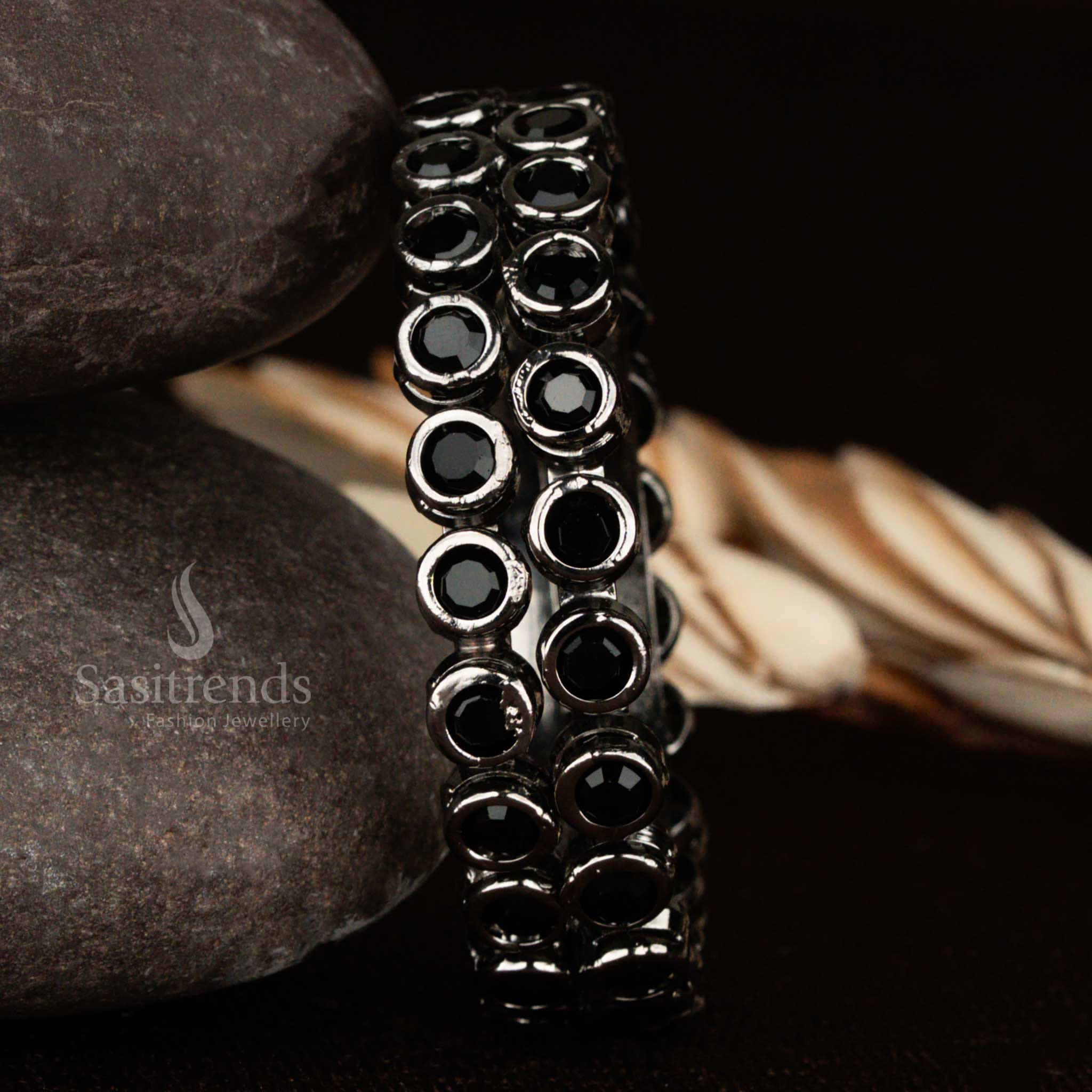 Bold vintage-look oxidised black bangles adorned with shiny black stones on a rich black metal base, designed for statement styling with party or ethnic outfits – Sasitrends