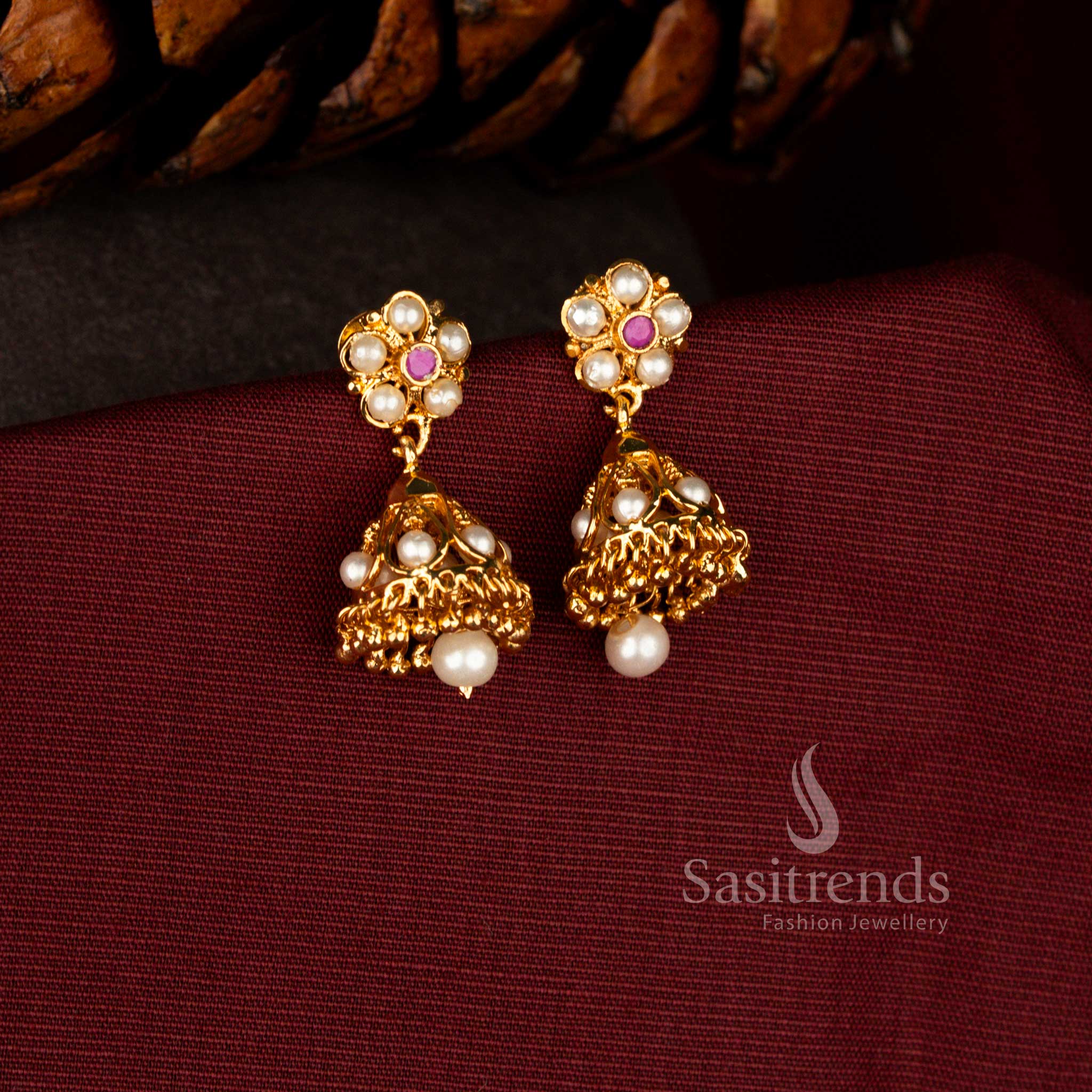 Radiant micro gold earrings in pearl-ruby showcasing floral jhumka silhouette with pavalam and stone detailing, perfect for festive dressing – Sasitrends