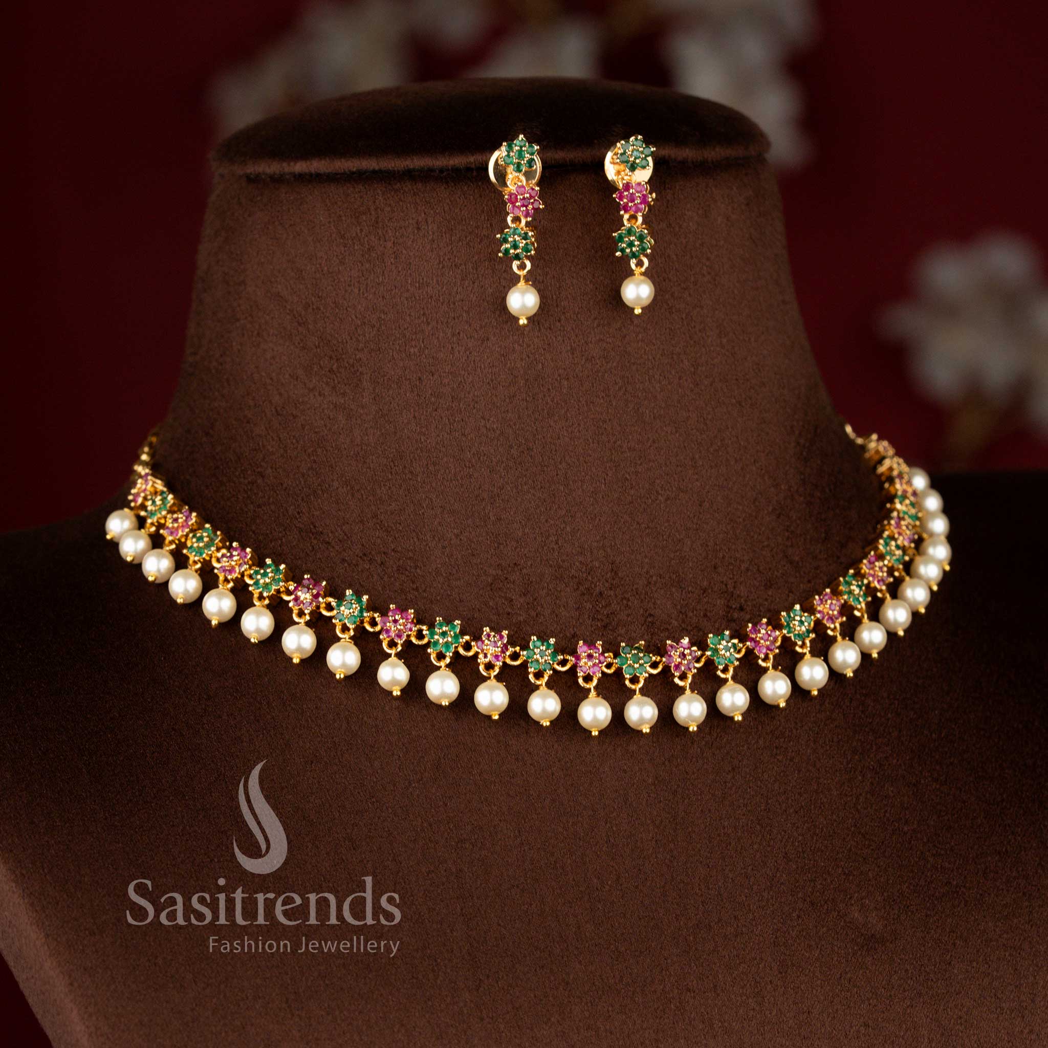 Opulent micro gold plated AD star floral necklace in ruby-green shades with pearl drops, crafted in one gram jewellery, 24K gold shine – Sasitrends