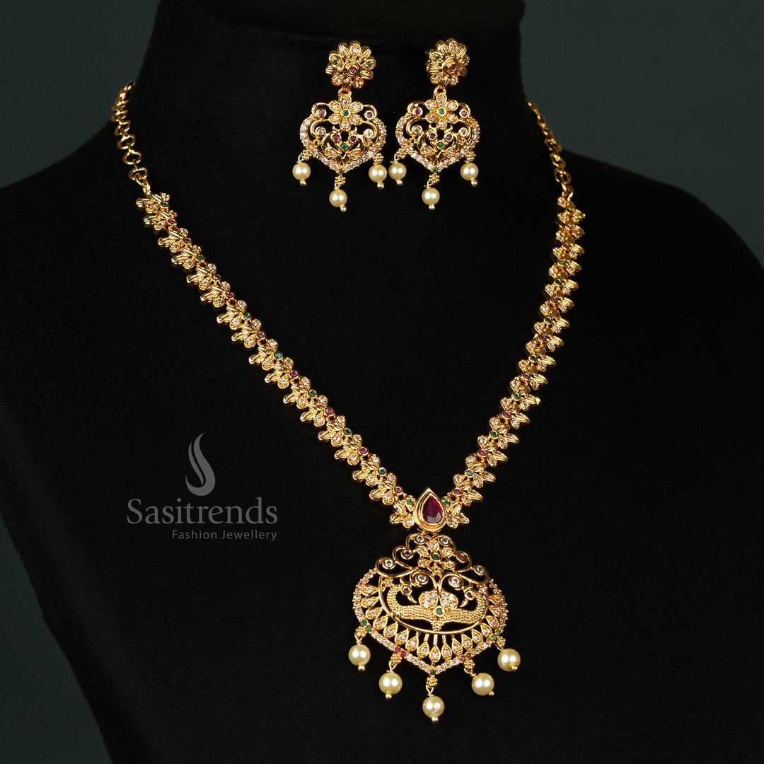 Gold plated AD jewellery set featuring floral motif chain, intricate peacock pendant, and matching earrings, look like real gold - Sasitrends