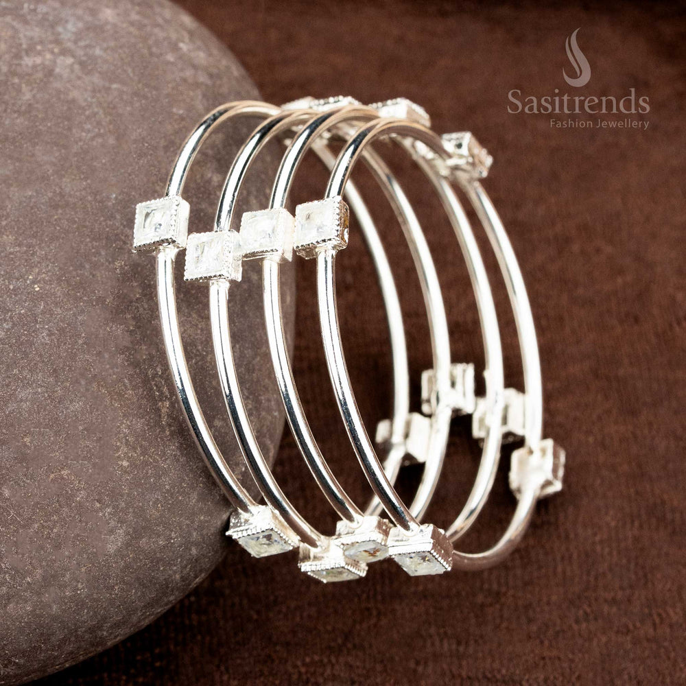 Minimal charm silver-white German silver bangles pair with delicate shine and fine artisan texture, crafted as an everyday elegance jewellery essential – sasitrends