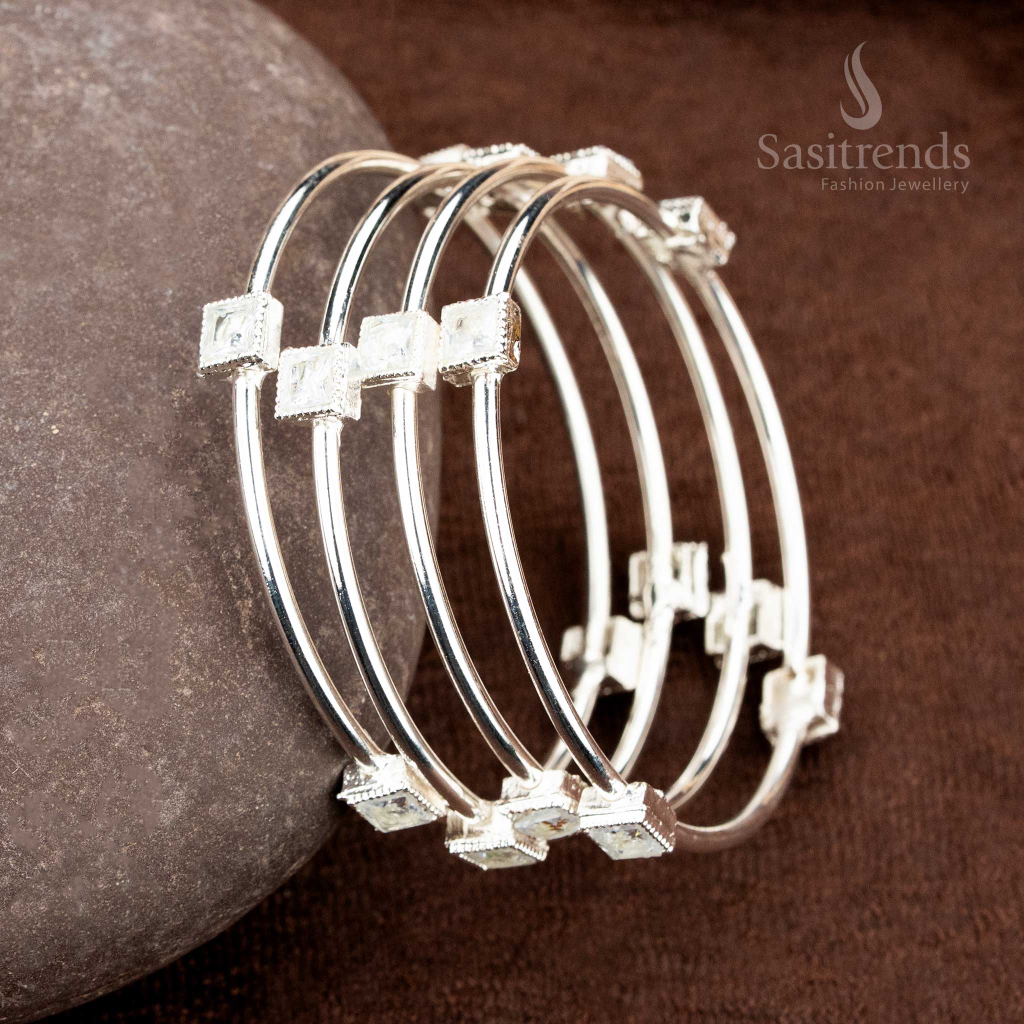 Minimal charm silver-white German silver bangles pair with delicate shine and fine artisan texture, crafted as an everyday elegance jewellery essential – sasitrends
