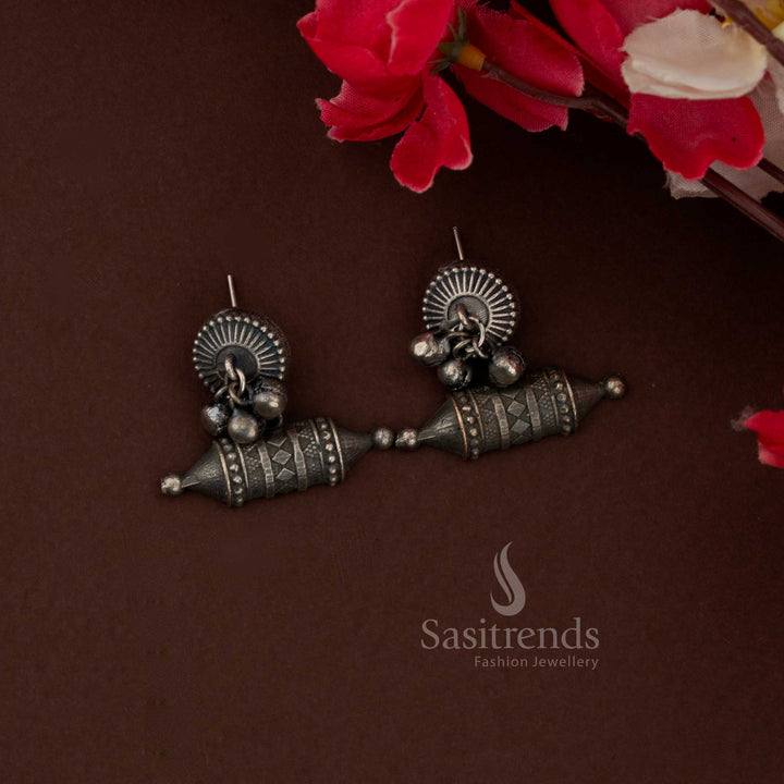 Oxidised peacock stone dangle earrings in white-black hues perfect for ethnic functions and party styling – Sasitrends