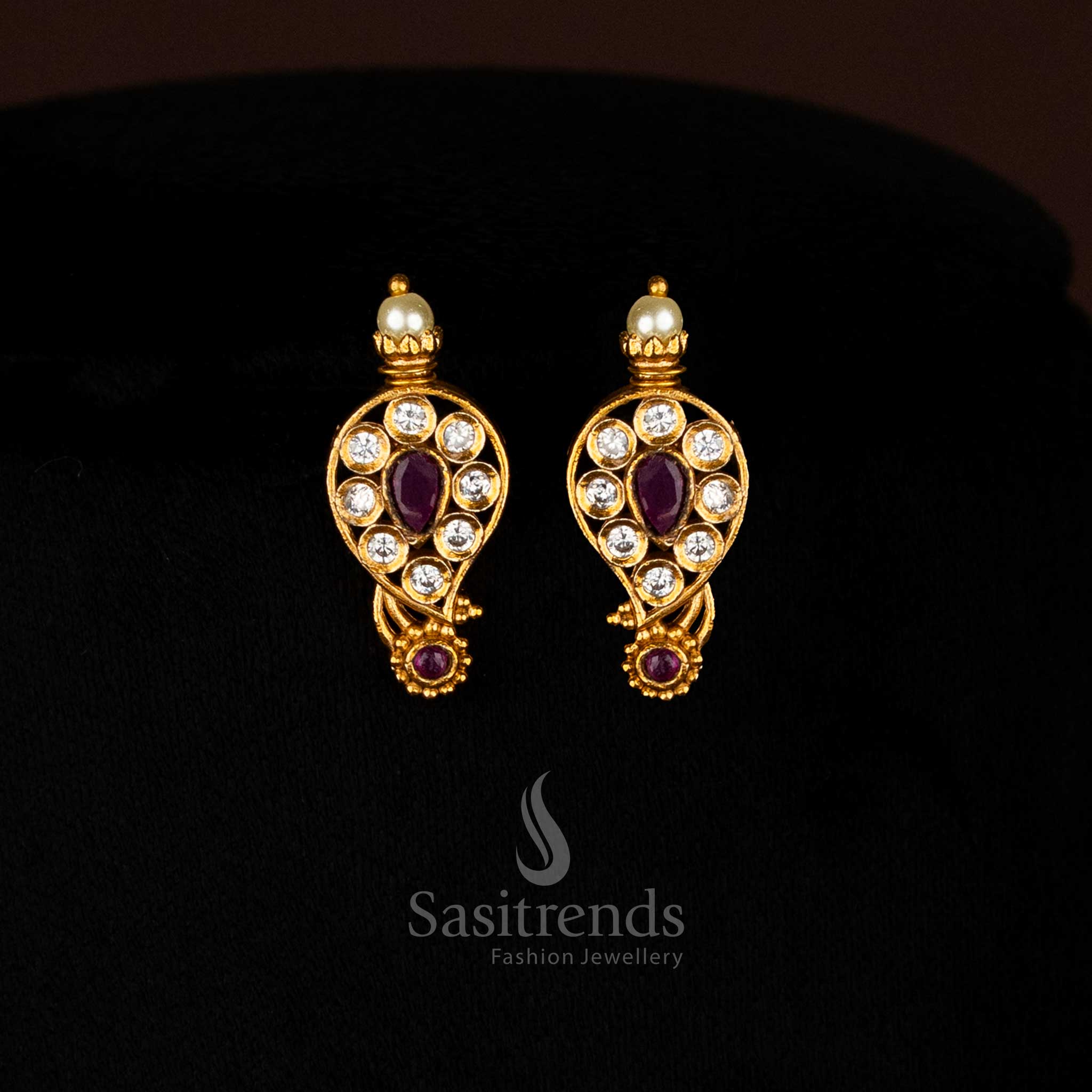 Premium matte gold white ruby temple earrings with delicate mango stick patterns and AD stone details for ethnic charm - Sasitrends