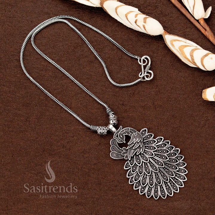 Antique tribal oxidised necklace featuring engraved peacock design – Sasitrends