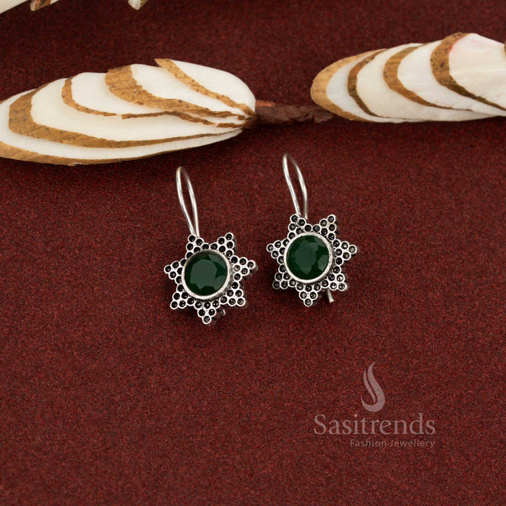 Verdant glow oxidised silver star floral drop earrings green designed with subtle artistry perfect for workplace fashion, everyday outings and effortless casual looks – Sasitrends