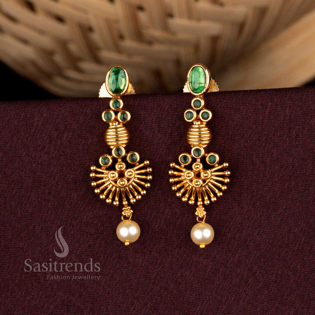 Sacred green temple earrings designed with celestial matte gold brilliance, baroque sunburst detailing, resplendent AD stones, and noble pearl artistry for weddings – Sasitrends