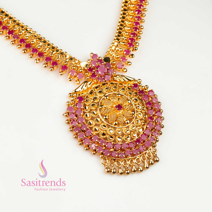 Graceful ruby-coloured micro gold necklace featuring traditional tilak stone motifs and a temple-inspired design, ideal for festive and ceremonial wear – Sasitrends