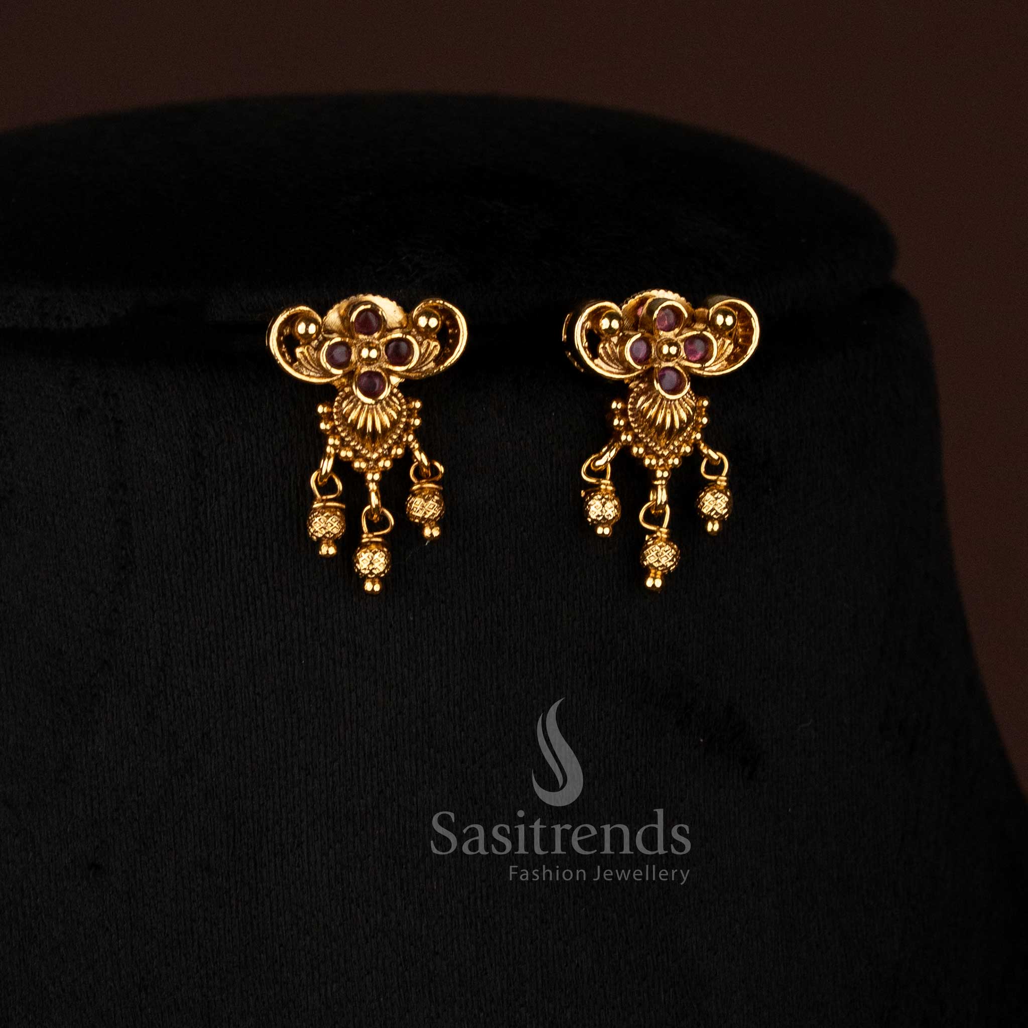 Opulent Traditional Matte Gold Plated AD Peacock and Floral Stud Earrings Featuring Teardrop Stones, Perfect for Grand Festive Jewellery Ensembles – Sasitrends
