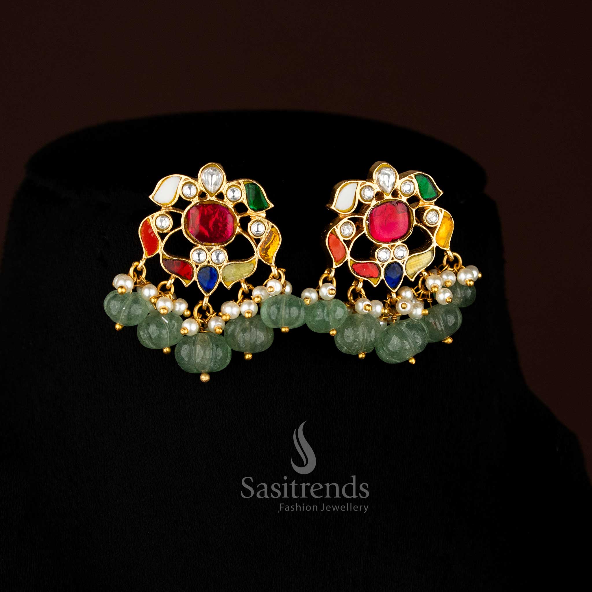 Majestic Bloom Harmony Jadau gold plated floral earrings accented with Navarathna detailing, faceted green beads, and pearl danglers, ideal for festive and evening occasions – Sasitrends
