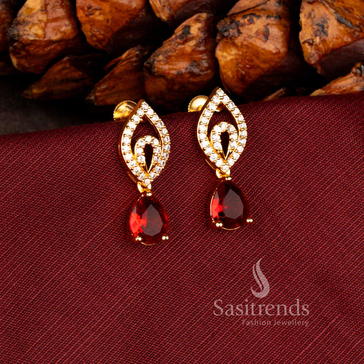 Traditional micro gold plated teardrop American diamond stud earrings with 24 carat gold finish and red stone inspired appearance – Sasitrends