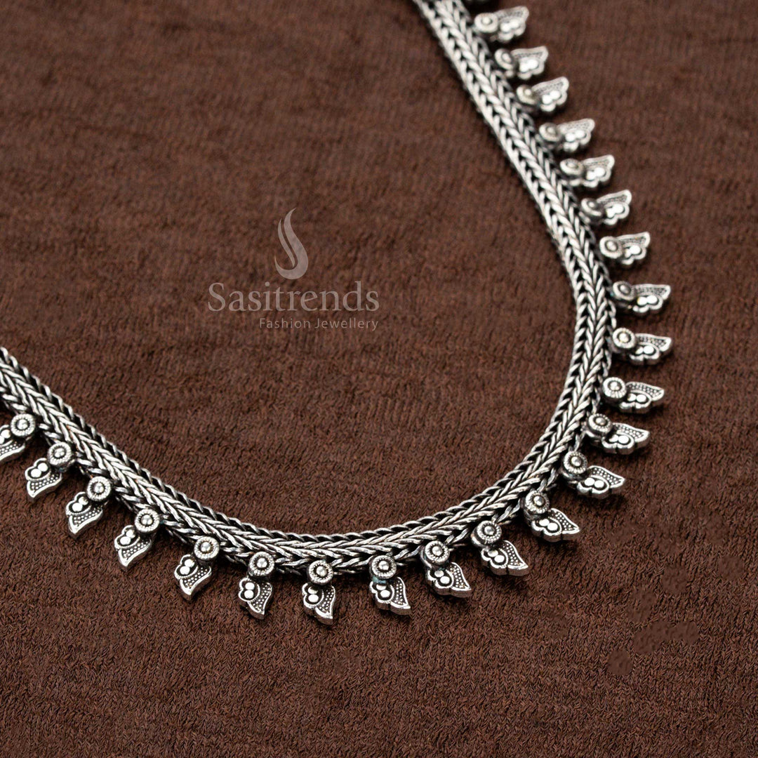 Handcrafted oxidised German silver necklace with intricately detailed tribal-inspired arrow charms, a rustic oxidised sheen, and a bold boho vibe—an ideal statement piece for sarees and cultural celebrations - Sasitrends