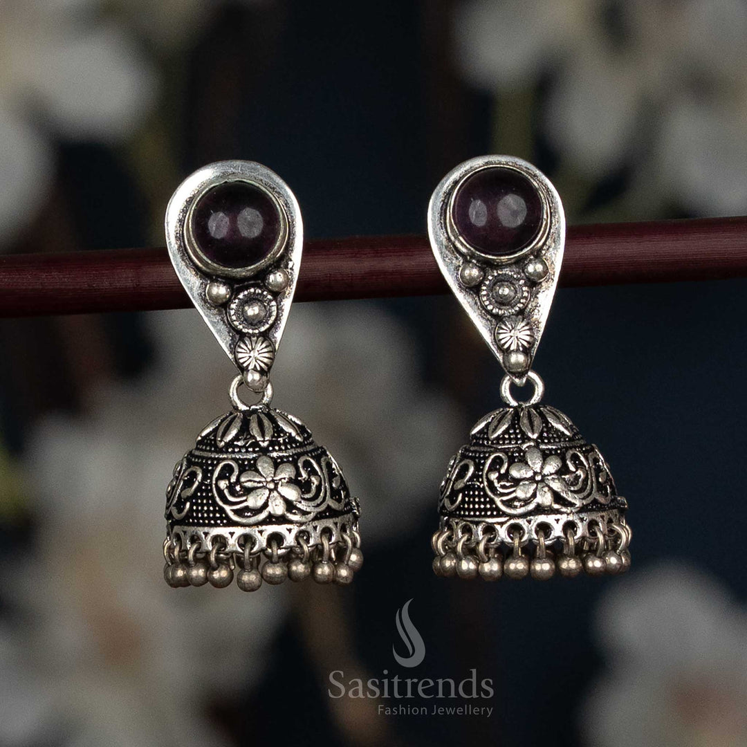  Oxidised Silver Jhumka Earrings Featuring Teardrop Stud, Floral Engraved Dome, And Violet Beads, Crafted For Women’s Festive And Traditional Ensembles – Sasitrends